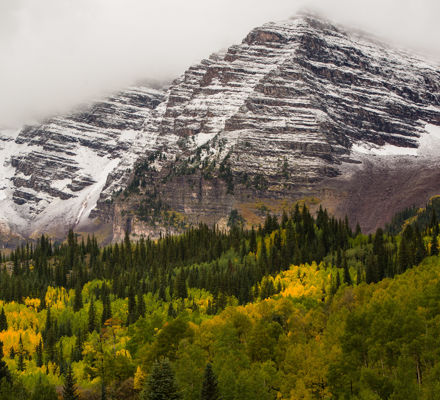 Autumn Foliage and early snow in Maroon Bells Wilderness