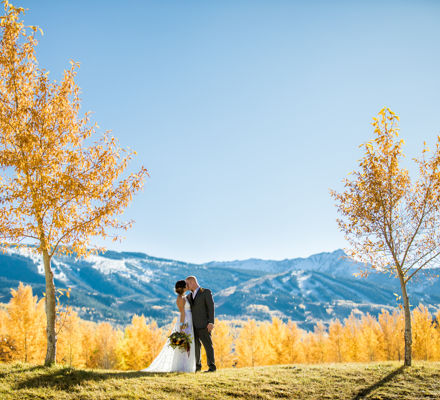 Sharing a first kiss in front of Snowmass' stunning mountains