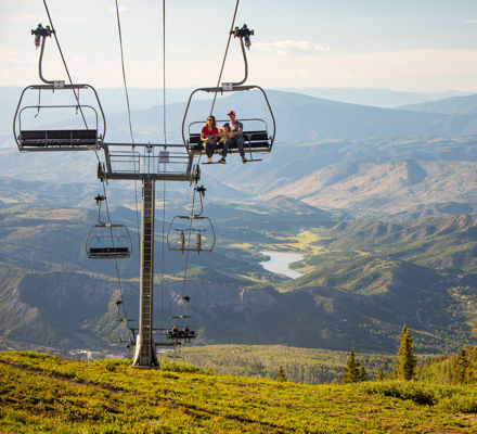 Summer chairlift rides on Snowmass mountain in Snowmass Colorado