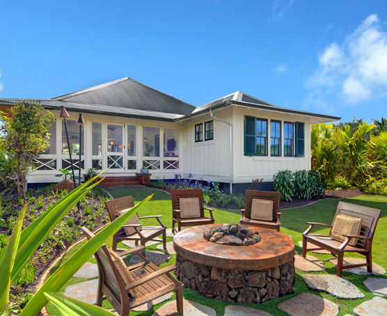Private backyard fire pit patio off lanai with comfortable seating for five to enjoy the evening breeze and stars.