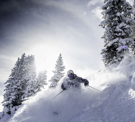 <b>Skier in back bowls powder in Vail, CO.</b>