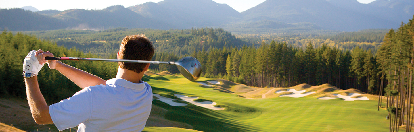 Golfer Teeing Off at Suncadia Resort Near Seattle