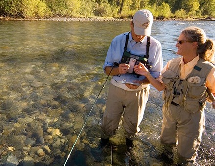 couple fly fishing together