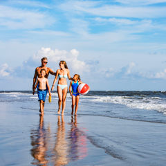 Family time on the beach at Wild Dunes Resort 