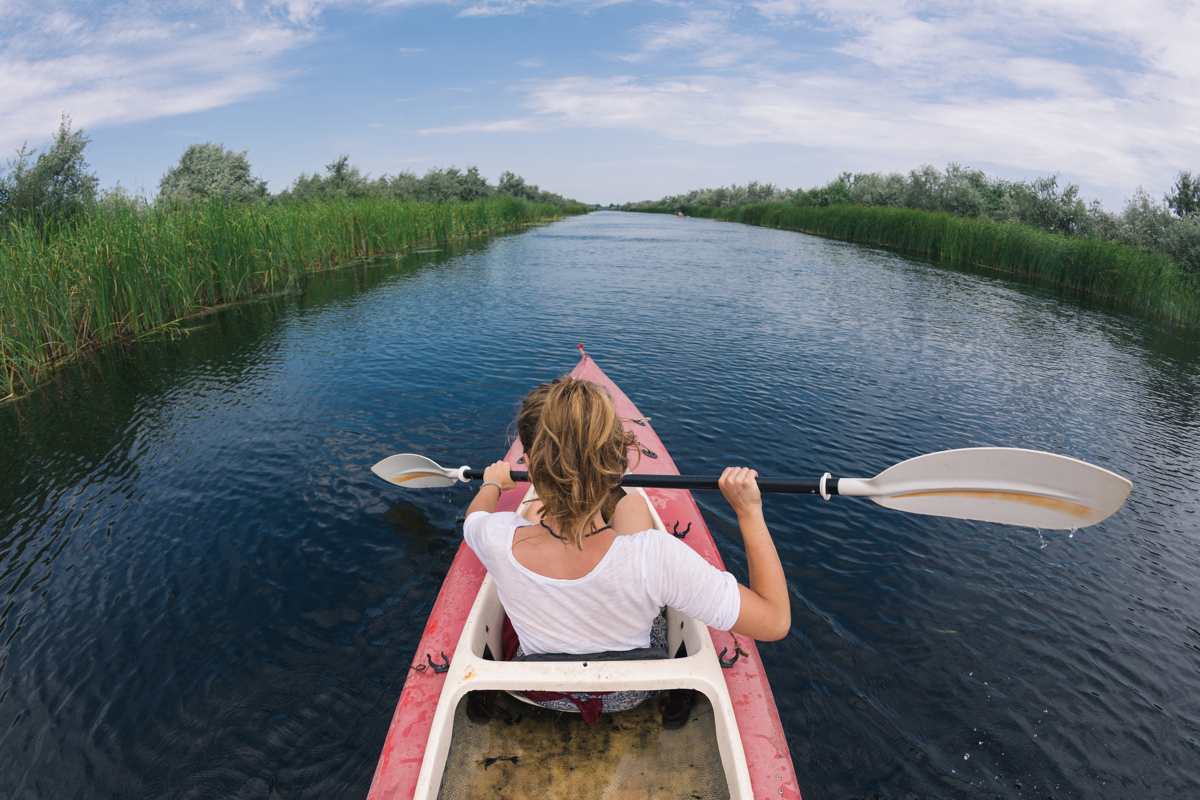 Destination discovery: girl on a kayaking adventure