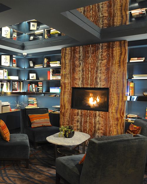 Sitting Area With Books And Fireplace