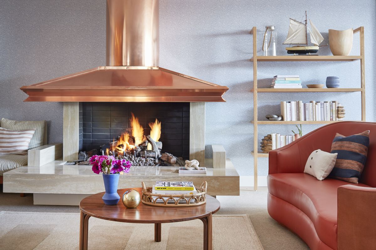 Waterfront-Hotel-Living-Room-Bookshelves-Fireplace