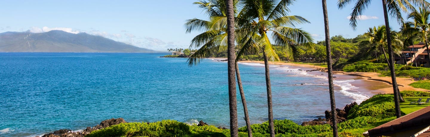 View of Makena Surf property, beach and West Maui Mountains